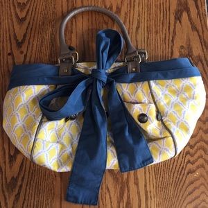 Yellow and navy blue Anthropologie purse.